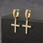 Elegant Cross Earrings crafted in Gold, Silver, and Rose Gold plating, featuring sparkling stones for a refined and modern look. Perfect for everyday elegance or special occasions. Elevate your style with the Shop8th Cross Earrings — sparkling statement pieces in Gold, Silver, and Rose Gold plating. Elegant, meaningful, and timelessly chic. Faith meets fashion. ✨ The Shop8th Cross Earrings — elegant sparkle with timeless meaning. Shop8th Silver Cross Earrings with sparkling stones on dark background