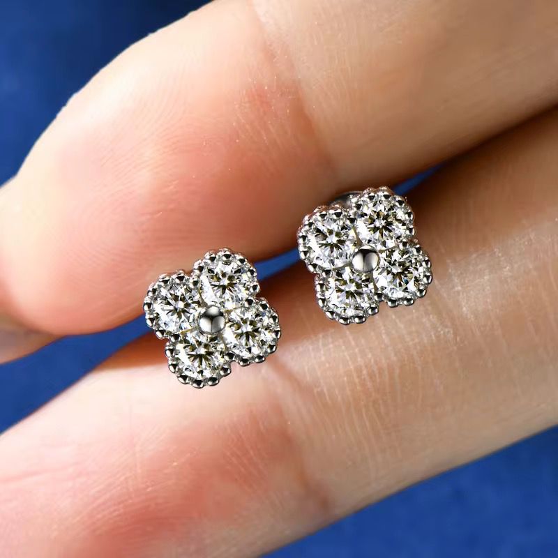 Sterling Silver Metal Base & Moissanite Stud Premium S925 Sterling Silver: Crafted with high-quality S925 silver for lasting brilliance and durability. Radiant Moissanite Sparkle: Features expertly cut moissanite stones that deliver diamond-like fire and exceptional clarity. Hypoallergenic & Skin-Friendly: Safe for sensitive ears, offering all-day comfort without irritation. Elegant Everyday Luxury: Lightweight, timeless, and versatile—perfect for both special occasions and daily wear. Tarnish-Resistant Finish: Designed to maintain its shine and beauty with minimal maintenance.